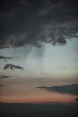 Blue/Gray/Orange sky overlay background with dramatic clouds at sunset