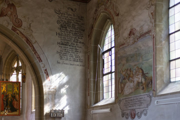german catholic church with religious details around altar and architecture in september