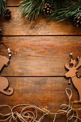 Christmas and New Year holiday background. Close up handmade ornaments of skate and deer and pine...