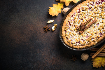 Autumn pie crumble with fruit ginger and spices. Top view.