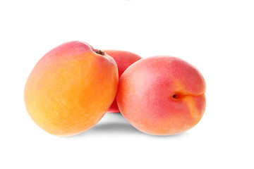 Fresh apricots on white background
