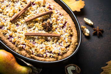 Autumn pie crumble with fruit ginger and spices. Top view.