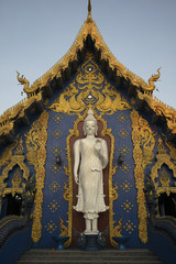 Statue of Buddha at temple, Rong Suea Ten Temple, Chiang Rai, Thailand