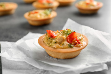 Broccoli quiche tartlet on table