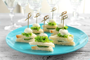 Mini sandwiches for baby shower on plate