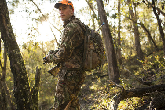 Portrait of hunter at sunrise