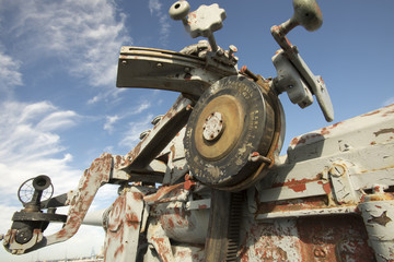 Sight and scope with barrel on rusting WWII  gun mounted on Liberty Ship