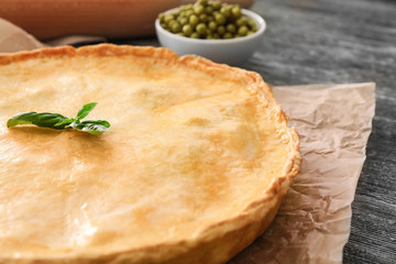 Delicious meat pie on table, closeup