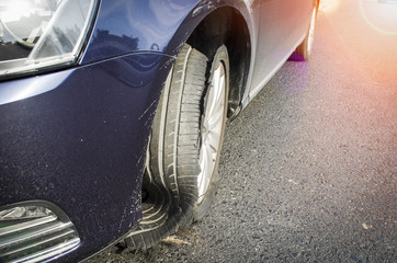 damaged tire after tire explosion at high speed on highway