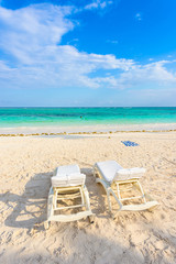 Relaxing on sun lounger at Akumal Beach - Riviera Maya - paradise beaches at Cancun, Quintana Roo, Mexico - Caribbean coast - tropical destination for vacation