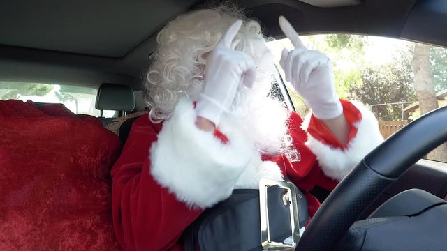 Funny happy Santa Claus driving car dancing slow motion 4K