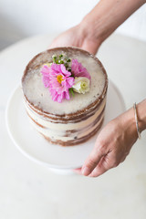 Naked Cake with Flowers and Hands