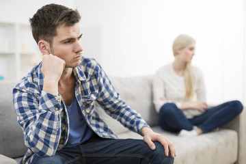Fototapeta premium The angry man sit near a woman