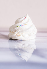 Classic italian dessert meringue cookies on marble table, selective focus