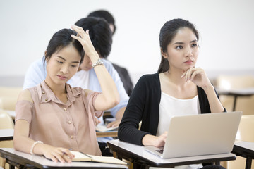 Asian People study together in classroom. People with Education concept.