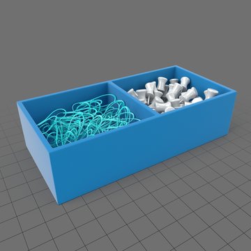 Tray with paperclips and thumbtacks