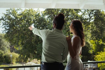 Couple looking at view in restaurant