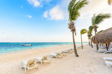 Relaxing on sun lounger at Akumal Beach - Riviera Maya - paradise beaches at Cancun, Quintana Roo, Mexico - Caribbean coast - tropical destination for vacation
