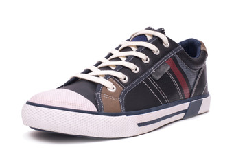 Fashion leather sneakers isolated on white background with clipping path.