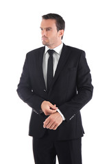 Handsome man in elegant black suit on white background