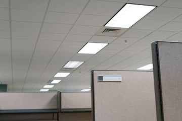office cubicle and room ceiling with lamp
