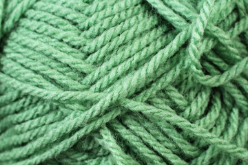 A super close up image of emerald yarn