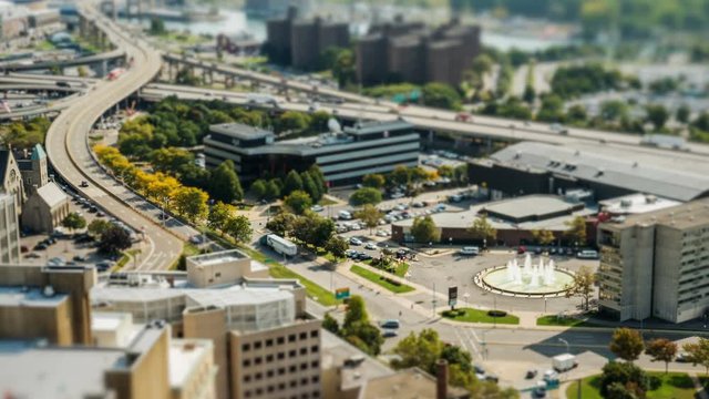 Buffalo, New York - Aerial city tilt shift time lapse video of busy city and traffic.