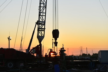 field oil workers at work