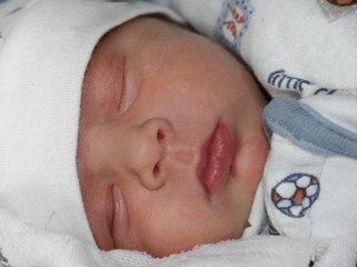 Cute newborn sleeping baby portrait