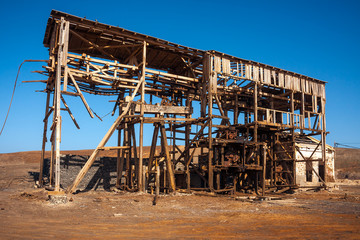 Wooden building of pulley system in salt mine in Cape Verde