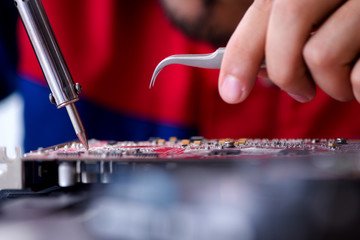 Repairman working in technical support fixing computer laptop tr