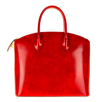 Red leather women's tote handbag on white background - Stock photo