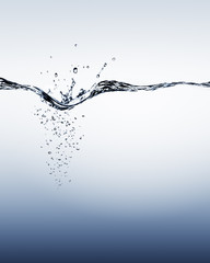 Blue water splash, water drops and bubbles depth gradient