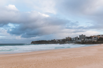 Obraz premium Cloudy view of Bondi Beach with no body on it.