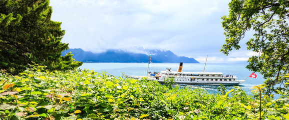 Begin your journey and discover switzerland with famous swiss cruise boat, wander through beautiful swiss alpine and vineyard riviera scenery in Switzerland, Europe.