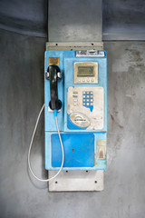 Blue vintage public pay phone