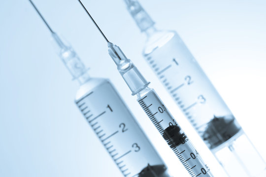 Vaccine with hypodermic syringe and needle