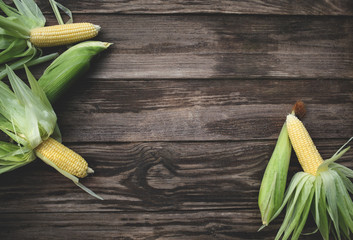 Corn on the Cob over Wooden Background