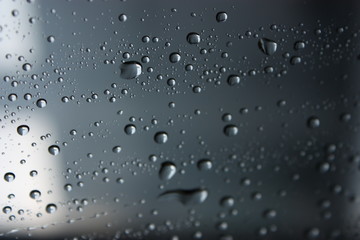 water drops dripping on a window