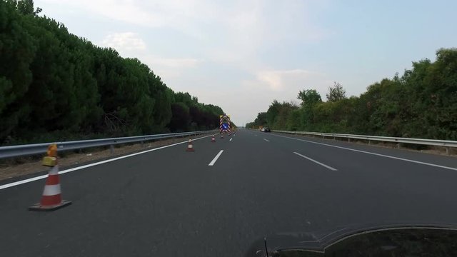 Construction Cones Along The Interstate Highway - Traffic In Construction 