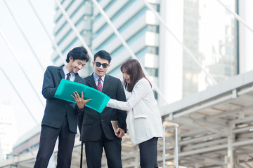 Selective focus Young Businesspeople Corporate Colleagues Talking Concept.