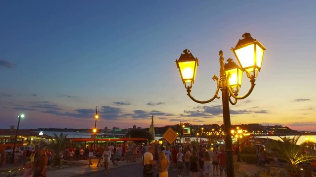 Tourists and traffic in old town of Nesebar, Bulgaria at 