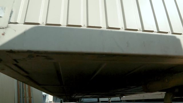 Transportation of a container with a cargo