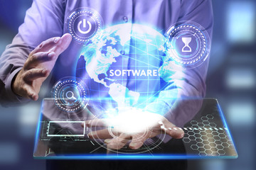 The concept of business, technology, the Internet and the network. A young entrepreneur working on...