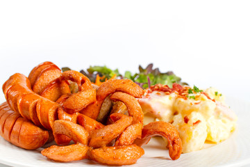 Mix sausage with potato salad