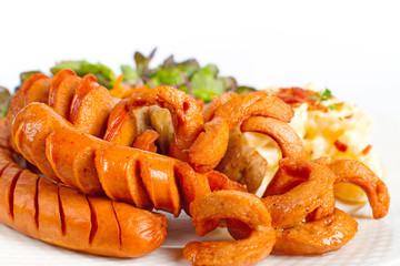 Mix sausage with potato salad