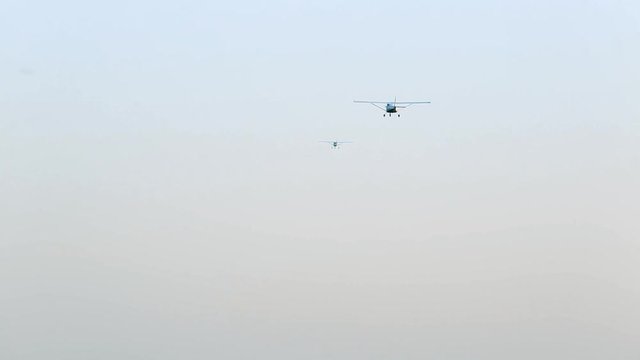 The plane flies in the sky