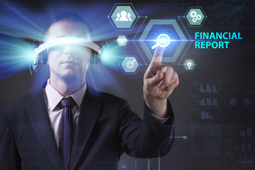 Business, Technology, Internet and network concept. Young businessman working in virtual reality glasses sees the inscription: Financial report