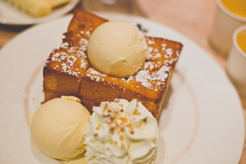 Honey toasts with whip cream,vanilla icecream dessert,Selective focus