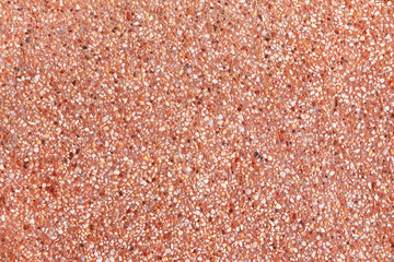 red marble with pebbles background